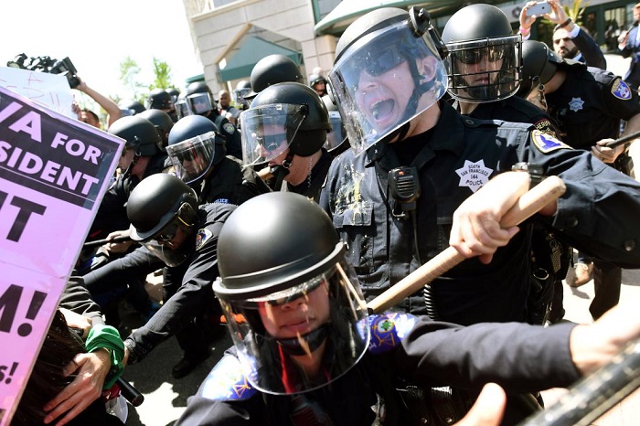 Protesters swarm Donald Trump event in California as tensions rise